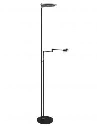 Design vloerlamp naast de sofa Steinhauer Turound zwart met glas