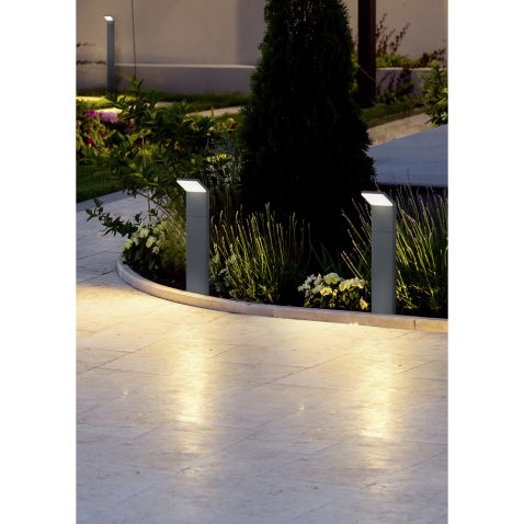 marble tile playground in the backyard of flowerbeds and lawn wi