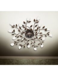 Chandelier on ceiling with classic design decorations and lights on in six lamps.