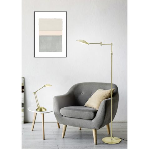comfortable armchair near coffee table with green plants, lamp a