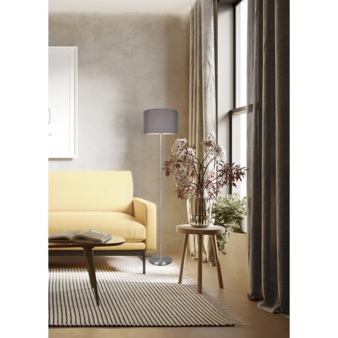 3d render of agrungy concrete room with a yellow sofa an art can
