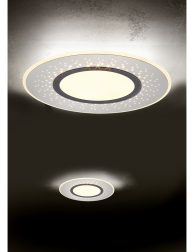Led lamps built into the ceiling glowing in the dark