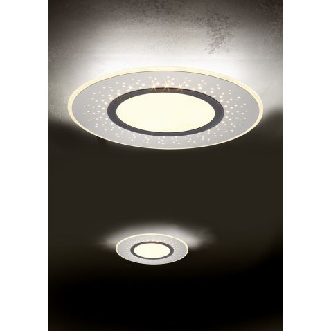 Led lamps built into the ceiling glowing in the dark