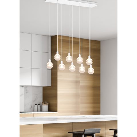 White and wooden kitchen corner with bar
