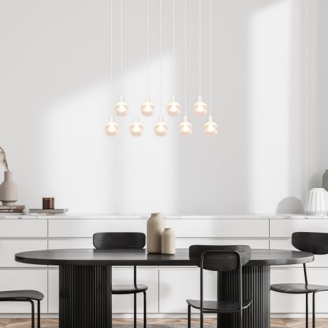 Bright living room interior with four chairs, dining table, sideboard