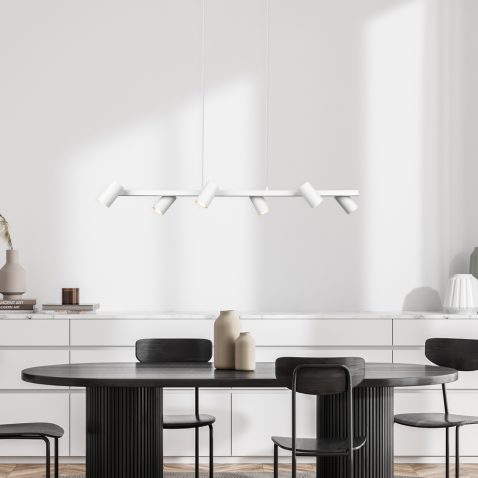 Bright living room interior with four chairs, dining table, sideboard