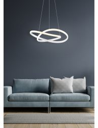 The interior has a sofa on empty dark wall background.