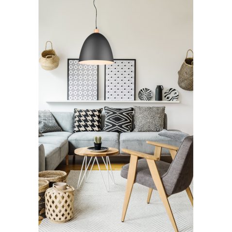 Grey wooden armchair in modern living room interior with posters