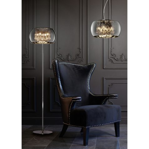 Stylish black chair against a dark gray wall