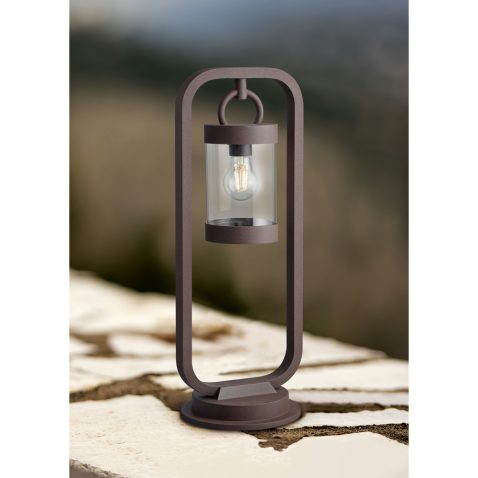 Retro classic style street electric iron lamp over stones