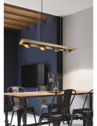 Modern sofa and dining table with iron chairs in the loft interi
