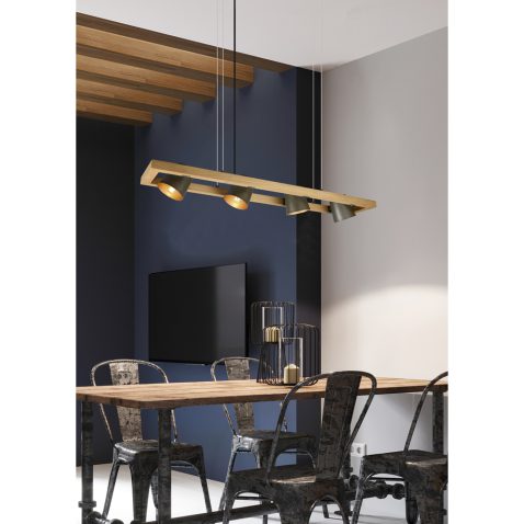 Modern sofa and dining table with iron chairs in the loft interi