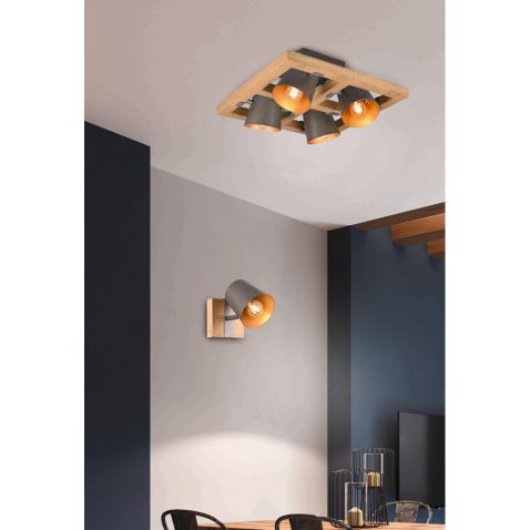 Modern sofa and dining table with iron chairs in the loft interi