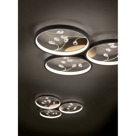 Led lamps built into the ceiling glowing in the dark