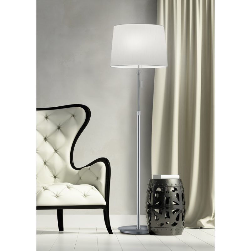 Luxury contemporary elegant armchair with stool and lamp